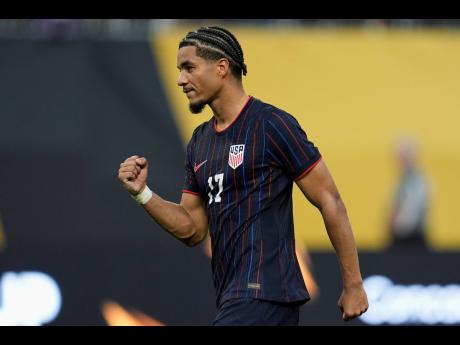 Credit: AP
United States forward Malik Leon Tillman celebrates after scoring during a penalty kick shootout of a Concacaf Gold Cup quarter-finals football match against Costa Rica, Sunday, June 29 in Minneapolis.