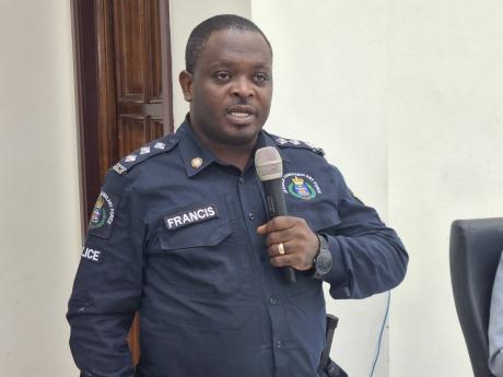 Credit: Photo by Albert Ferguson Deputy Superintendent of Police Kevin Francis, head of operations in the Westmoreland Police Division, addressing the Westmoreland Municipal Corporation’s monthly meeting last Thursday.