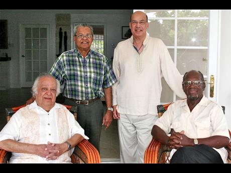 From left: The late Sir Shridath ‘Sonny’ Ramphal, the late Rickey Singh, Sir Ronald Sanders and Hubert Williams, Rickey’s long-time friend and fellow journalist, pose for a photo.