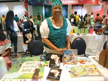 Dr Amina Blackwood-Meeks is a serious businesswoman despite the smile. No Anancy business at Christmas in July.