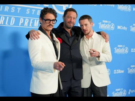 From left: Pedro Pascal, Ebon Moss-Bachrach, and Joseph Quinn arrive at the ‘Fantastic Four: First Steps’ premiere on Monday.
