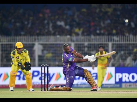 Kolkata Knight Riders’ Andre Russell plays a shot during the IPL 2025 match against Chennai Super Kings, at Eden Gardens, in Kolkata, India.