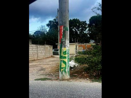 Credit: Contributed Political graffiti in the St Catherine East Central constituency.