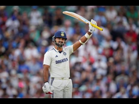 
India’s Akash Deep celebrates after scoring 50 runs during the third day of the fifth cricket Test match against England at The Kia Oval in London yesterday.