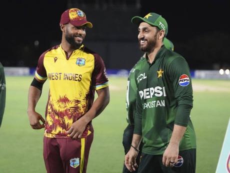 West Indies' Shai Hope, left and Pakistan's Salman Ali Agha, right, talk after Pakistan won the Twenty20 cricket series, Sunday, August 3, 2025, in Lauderhill, Florida. (AP Photo/Lynne Sladky)