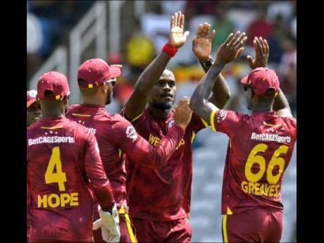 Credit: Courtesy of @wiplayers West Indies Player of the Series Jayden Seales (second right) celebrates with teammates after taking a Pakistan wicket during the third and final One-Day International at the Brian Lara Cricket Academy in Trinidad and Tobago. Seales bagged six for 18.