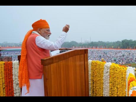 Indian Prime Minister Narendra Modi addresses the nation from the rampart of the 17th century Mughal-era Red Fort monument during the country’s Independence Day celebrations in New Delhi, India, Friday, August 15.