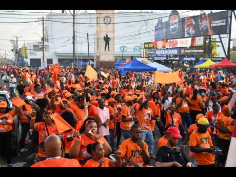 Supporters turn out for the People National Party’s Kingston and St Andrew parish meeting in Cross Roads on Saturday. 