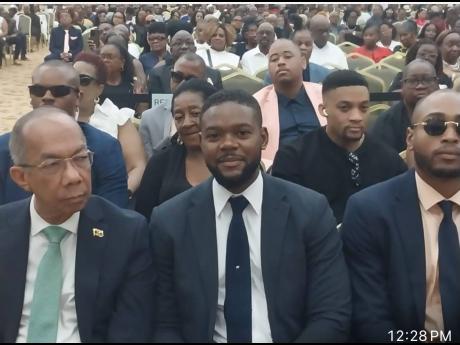 National Security Minister Dr Horace Chang (left) and Montego Bay Mayor Richard Vernon at Earle’s funeral.