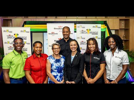 Credit: Contributed GK Birthright Interns Josiah Royes (far left), Kyrah McIntosh, Lauren Roach (second from right), and Abigail Ralph (far right), with GK Foundation Chair Professor Julie Meeks-Gardner (third from left), Minister of Foreign Affairs and Foreign Trade Senator