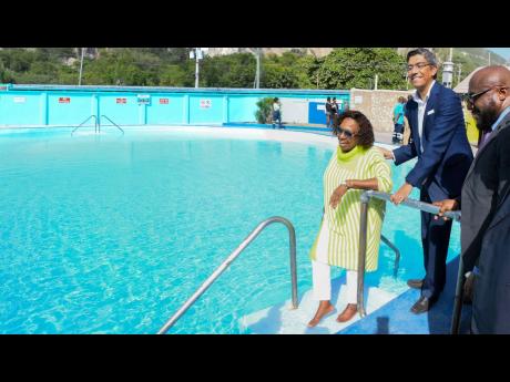 Minister of Culture, Olivia Grange, Managing Director of Carib Cement, Jorge Martinez, and Executive Director of the Jamaica National Heritage Trust, Leslie Harrow (right), pictured at the reopening of the Rockfort Mineral Bath on Thursday, August 21. 
