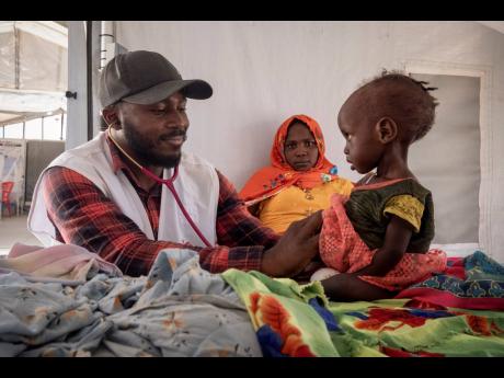 Sudanese children suffering from malnutrition are treated at an MSF clinic in Metche Camp, Chad, near the Sudanese border.