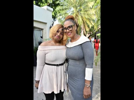 Gabriela Stewart (left), the Lois Lake Sherwood art scholarship and bursary awardee, with her mother Rosemarie Hall Stewart at the Burger King Jamaica National Scholarship Awards.