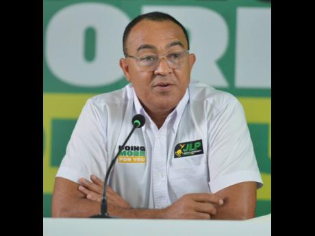 Jamaica Labour Party (JLP) election campaign director Dr Christopher Tufton speaking at a press conference on August 27.