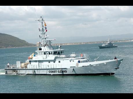 The third county class vessel, HMJS Surrey, sails into the Jamaican shores on her arrival the Jamaica Defence Force Coast Guard Headquarters, HMJS Cagway, Port Royal on Friday, December 1. 