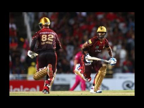 Credit: File
Colin Munro (left) and Nicholas Pooran scored half-centuries in the Trinbago Knight Riders’ victory over the Barbados Royals.