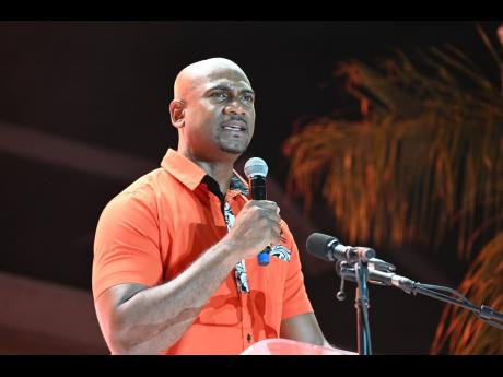 People's National Party spokesperson on health Dr Alfred Dawes 
speaking at a PNP mass rally at Sam Sharpe Square in Montego Bay, St James on August 31.