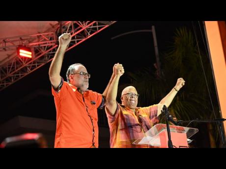 Former People’s National Party President Dr Peter Phillips (left) sharing the stage with current PNP president Mark Golding at a PNP mass rally at Sam Sharpe Square in Montego Bay, St James on August 31.