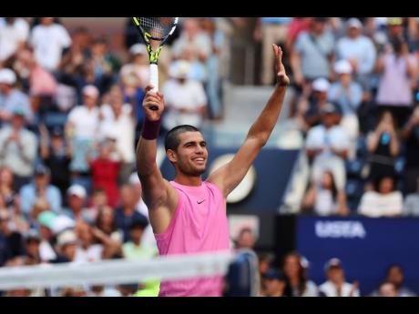 Carlos Alcaraz of Spain, reacts after beating Arthur Rinderknech of France during the fourth round of the US Open tennis championships in New York yesterday.