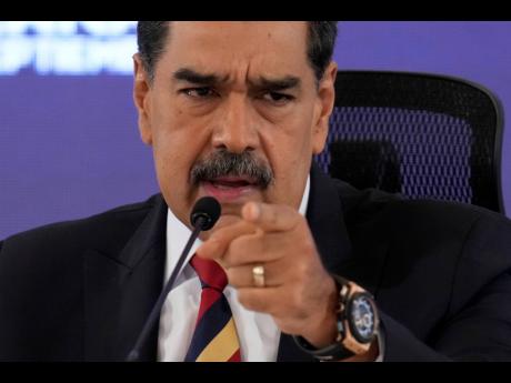 Venezuela President Nicolas Maduro speaks during a press conference in Caracas, Venezuela, Monday, September 1, 2025. (AP Photo/Ariana Cubillos)