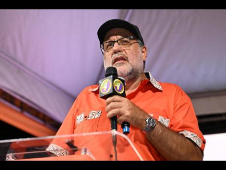 Credit: Gladstone Taylor Mark Golding, president of the People's National Party, addresses supporters after Wednesday’s election results.