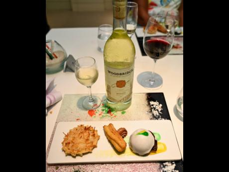 The fiesta trio: gizzada, churros, and fruit cake served with Select Brands’s Woodbridge Moscato.