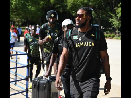 Kishane Thompson and other Jamaican athletes arriving for training yesterday.