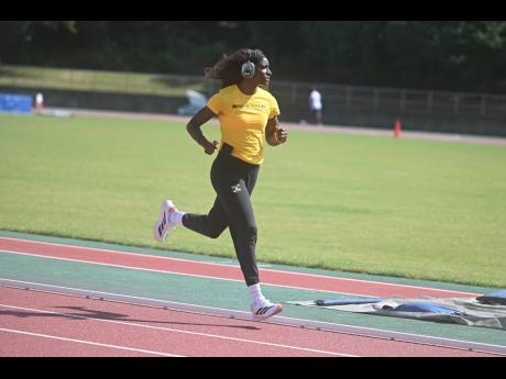 Shiann Salmon, 400m hurdler, going through her routine on Thursday.