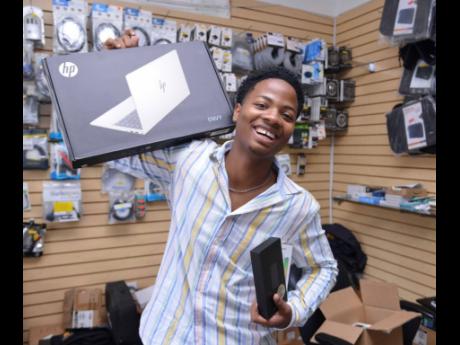 Credit: Antoine Lodge/Photographer Seventeen-year-old entrepreneur Aaden Dunn, who is the owner and operator of Unstoppable Enterprises, in an interview with The Gleaner on Wednesday at his operating base on Lindsay Crescent in St Andrew.