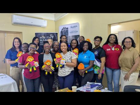 Organizers and participating master trainers representing Early Stimulation Project, Community-based Rehabilitation of Jamaica, Montego Bay Autism Centre, McCAM Child and Development Resource Centre, and Parent Vision, Jamaica. These trainers will lead cap
