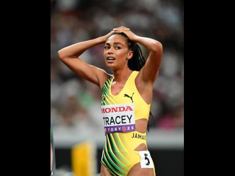 A dejected Adelle Tracey moments after competing in the women’s 1,500-metre qualifiers at the Japan National Stadium in Tokyo yesterday. Tracey finished 13th in heat three.