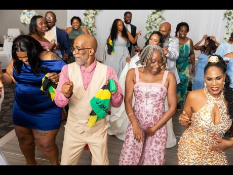 The Jamaican flags were out in full swing as the mostly Jamaican guests took to the dance floor.
