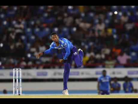 St Lucia Kings Khary Pierre bowling on his way to figures of 3-24 during a Caribbean Premier League game against Barbuda Falcons at the Daren Sammy National Stadium last year. 