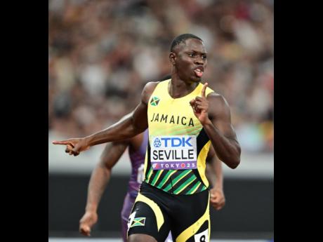 Oblique Seville asks for silence in a trademark move whenever he wins during the semifinals of the 100 metres at the World Athletics Championships on Sunday. He went on to forget the tradition when he claimed the title later that day.