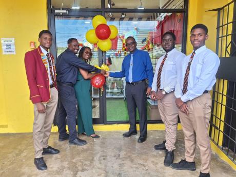 Credit: Photo by Albert Ferguson From left: Jherron Hylton, president of the Cornwall College Student Council Association; Dr Richard Meggo, chairman of the Cornwall College school board; Michelle Sterling, bursar; Michael Ellis, principal of Cornwall College; Jordan Forrester, deputy hea