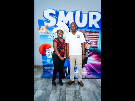 Principal of Siloah Primary School Oneil Larmond (right) with 12-year-old former student, Terriann Haye who was recently placed at St Elizabeth Technical High School. 