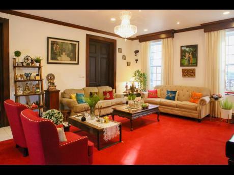 The living room showcases the vibrancy and traditions of Indian decor.