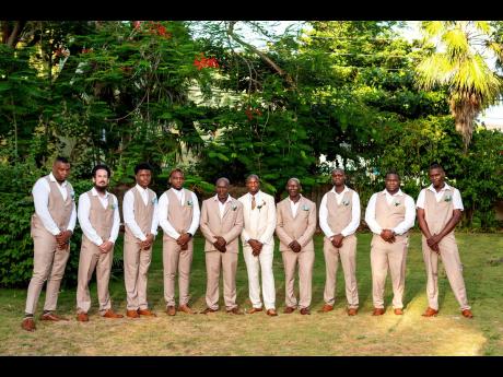 Michael thanks his groomsmen, dapper in tan, for their support on the special day.