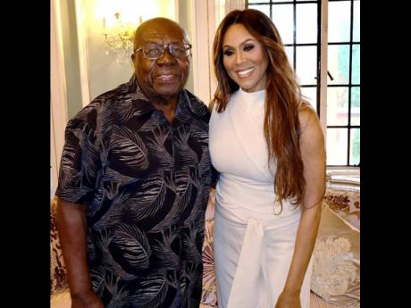 Oliver Samuels with Canadian singer-songwriter and actress, Debra Cox at her concert in Toronto at Casa Loma.