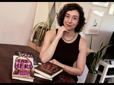 Thriller novelist Andrea Bartz is photographed in her home, in the Brooklyn borough of New York, Thursday, September 4, 2025 (AP Photo/Richard Drew)