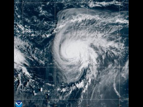 Credit: This satellite image provided by NOAA shows Hurricane Humberto on Friday, September 26, 2025. (NOAA via AP)