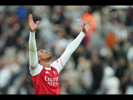 Arsenal’s Gabriel celebrates after the English Premier League  match against Newcastle at St James’ Park, Newcastle upon Tyne, yesterday. Arsenal won 2-1.