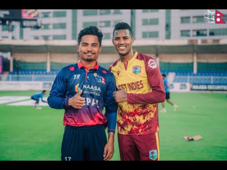 West Indies Captain Akeal Hosein (right) and his opposite number, Rohit Paudel. 