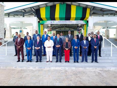CARICOM Heads of Government pose for a group photo at the 49th Regular Meeting of the Conference of Heads of Government of the Caribbean Community in Montego Bay, Jamaica.