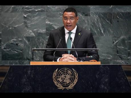 
Jamaica Prime Minister Andrew Holness addresses the 80th session of the United Nations General Assembly in New York, on September 26.