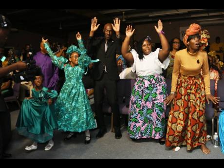Front row patrons enjoying the moment at the Sterling Gospel Music Awards on Saturday. 