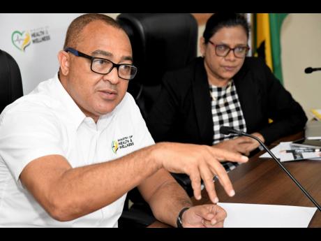 Minister of Health and Wellness Dr Christopher Tufton and Dr Jacquiline Bisasor McKenzie, Chief Medical Officer at the Ministry. - File photo.