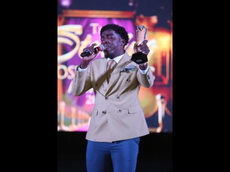 right: Johnmark Wiggan gives thanks after receiving Album of the Year for ‘Validation’ during the 2024 Sterling Gospel Awards held on October 6, 2024 at the Emmanuel Apostolic Church in Kingston.
