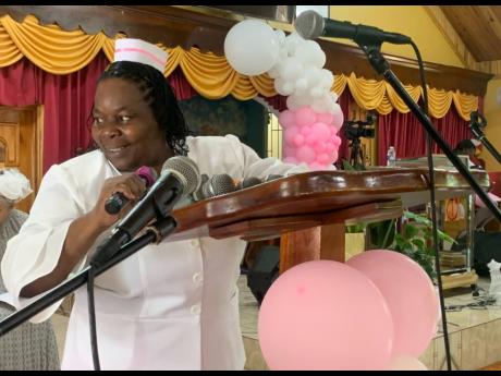 NPCA President Ivin Malahoo heaping praise on her colleagues for their dedicated service.