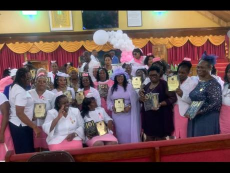 Some of the awardees with their plaques.